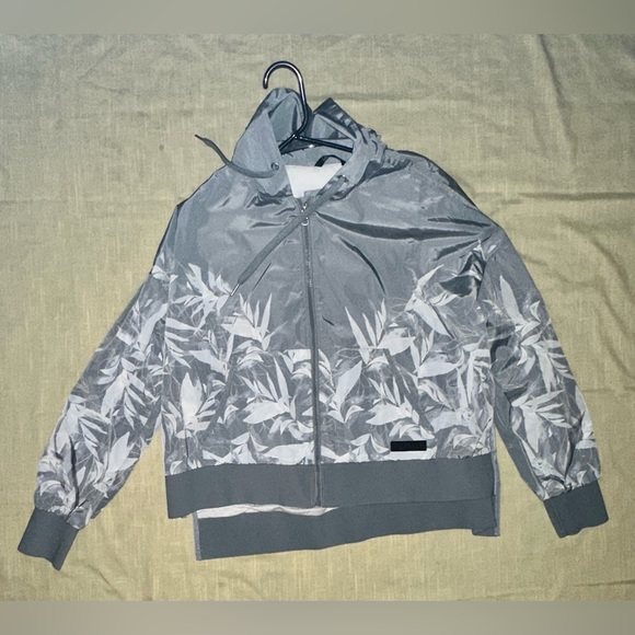 CK Light gray wind/rain jacket. It’s in good shape with no damage. - Picture 1 of 2